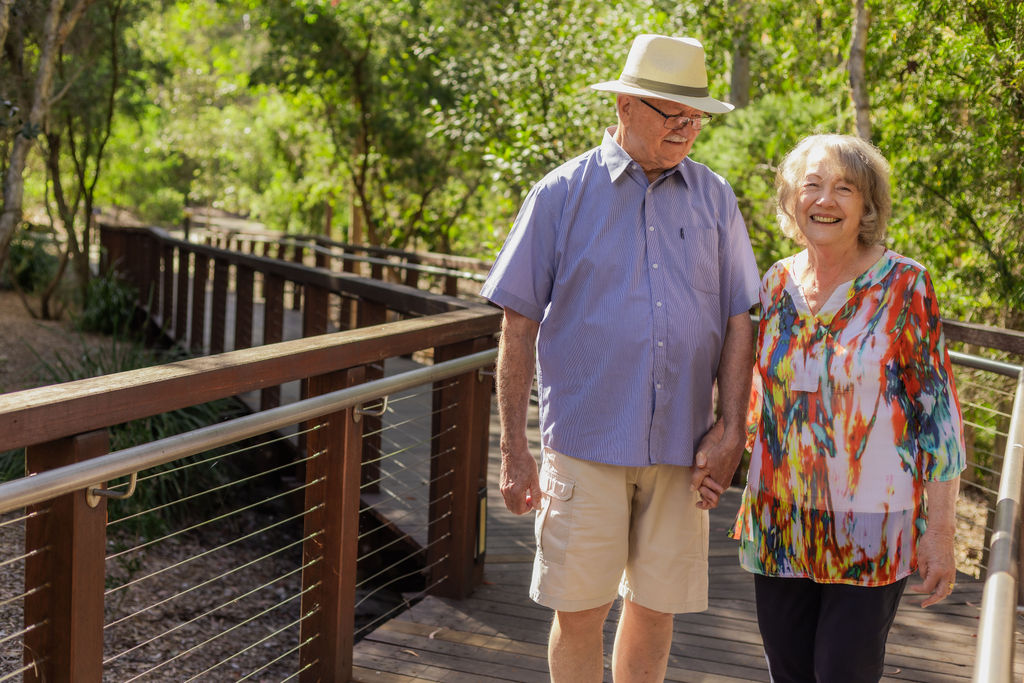 Couple walking along path